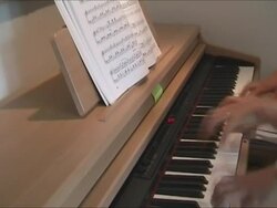 Woman learning to play the piano. With sound. Stock Footage