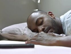 CU Man Waking Up In The Morning Stock Footage