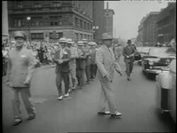 U.S. President Harry S. Truman jumps out of his car to march in a parade. News Clip