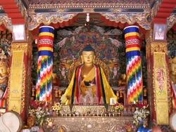 MS View of statue of Buddha with colorfull interior in monastery / Gaya, Bihar, India Stock Footage