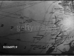 1953: NEW ORLEANS: GATEWAY TO THE WORLD: CU Globe map of Europe & upper Africa, globe turning back to United States, highlighted 'New Orleans' superimposed on map. Instructional Video