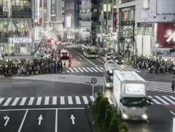 TL, MS Crowds and traffic on Hachiko Crossing, Shibuya, at night / Tokyo, Japan Stock Footage