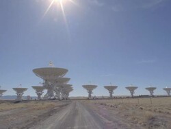  WS POV View of satellite dishes at Very Large Array in arid desert landscape / San Augustine, New Mexico, USA Stock Footage