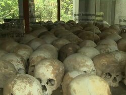 Pan Left Shot Skull in Killing Fields Phnom Penh Cambodia Stock Footage