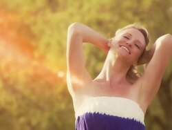Woman enjoys freedom in the sun Stock Footage