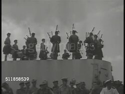 1950: KOREAN CONFLICT (WAR): British ship in harbor, Scottish Pipe & Drums (bagpipers) playing on deck, soldiers laughing. South Korean children waving flags. Filipino soldiers arriving from Philippines. Unidentified soldiers on truck. The Cold War. Instructional Video