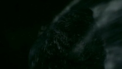 An asteroid flies through space and enters the Earth's atmosphere. Stock Footage