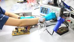 Engineer working at electronics industry Stock Footage