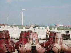 WS Workers working and painting tetrapod for water break / Jeju, Jeju-do, South Korea Stock Footage