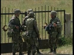 YUGOSLAVIA: KOSOVO: KACANIK: TROOPS GUARD SUSPECTED MASS GRAVE News Clip