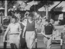 1952: TEL AVIV, ISRAEL: VS Busy modern city, people walking, urban traffic moving streets, crossing at cross-walk, bus moving from stop. Tel-Aviv-Yaffo, Achuzat Bait, first Jewish city. Instructional Video