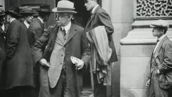 1921 WS Government and Miners' Federation team members exit the Board of Trade building after negotiations / United Kingdom Stock Footage