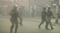 Police clash with anti-government protesters News Clip