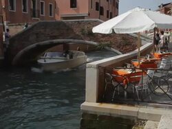 WS LD Boat Going under Bridge in Canal / Venice, Italy Stock Footage