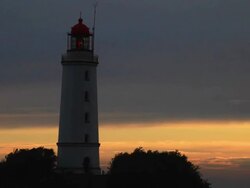 Sunrise lighthouse time lapse Stock Footage