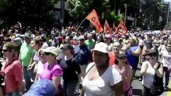 VOICED : Marchas contra y pro Chavez News Clip