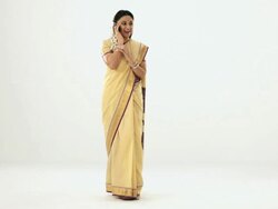 Portrait of a south Indian woman talking on a mobile phone  Stock Footage