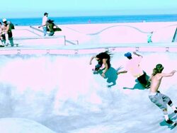 WS SLO MO Shot of skateboarders dropping in and riding around bowl / Venice, California, United States Stock Footage