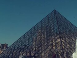  MS PAN Louvre palace and pyramid with fountain in front of museum  / Paris, France  Stock Footage