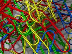 (Loop) Spinning Paper Clips Stock Footage