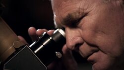 Old man in observatory Stock Footage