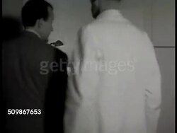 1948: DRAMATIZATION HOSPITAL ROOM: Semi Private 416 room sign. Nurse in semi-private room, doctor & surgeon come into room, talk w/ 'Mrs. Conrad', she will do fine. 'Mrs. Conrad' resting. Instructional Video