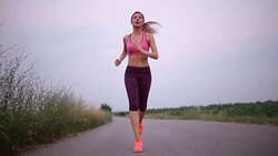 Fit woman running fast Stock Footage