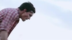 Guy dances in front of Las Vegas welcome sign Stock Footage