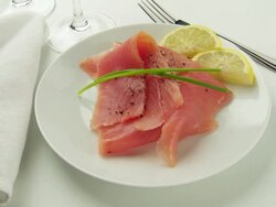 Salmon rotates on white plate with lemon & dill Stock Footage