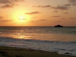 WS View of One boat standing on beach near Santa Maria during sunset / Santa Maria, Sal, Cape Verde Stock Footage