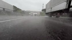 Car driving at rainy day - 4K - rear view Stock Footage