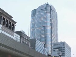 WS ZO T/L View of Roppongi Hills shopping complex at dusk / Roppongi, Tokyo, Japan Stock Footage