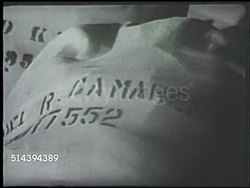 1942: UNITED STATES ARMY: VS Various U.S. Army soldiers carrying & loading luggage onto train, boarding train for departure. WWII, World War II, mobilizing, Pacific Front Instructional Video