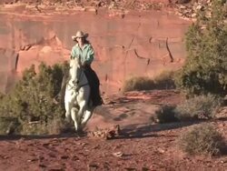MS TS Women Galloping Horse through Majestic Red Rock Mountains / Telluride, Colorado, United States  Stock Footage