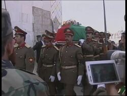 Wife of former king buried News Clip