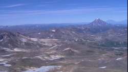 Snowy mountains overlook the Kamchatka Peninsula. Stock Footage