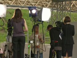 MS Shot of television news crews working outside during G8 meeting / Hokkaido Toyako, Japan Stock Footage