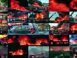 Video wall of big  fire in the city Stock Footage
