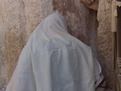 MS ZI Man holding prayer book and praying at Wailing Wall / Jerusalem, Israel Stock Footage