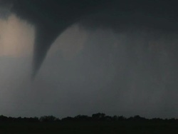 MS Shot of tornado at dusk reaching down to ground / Thornberry, Texas, United States Stock Footage