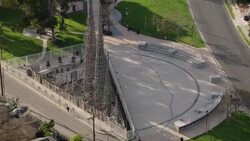 Aerial shot panning around the famous Watts Towers in South Los Angeles. Stock Footage