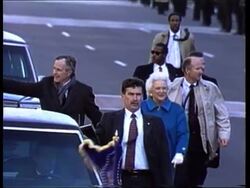 President George H.W. Bush and his wife Barbara walk along Pennsylvania Ave. during the Inaugural Parade News Clip