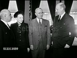 1945: WASHINGTON, D.C.: South Portico of White House. WS Senator Herbert H. Lehman, First Lady Bess Truman, President Harry S Truman standing w/ unidentified male in office. Instructional Video