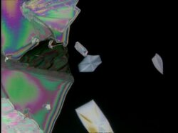 T/L CU colourful crystals grow across frame Stock Footage