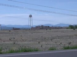 (HD1080i) Crime: Abandoned Prison in Barren Desert, Zoom Stock Footage