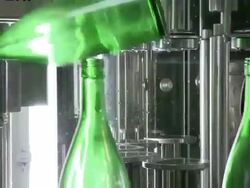 CU Champagne bottles on production line / Ayl, Rhineland-Palatinate, Germany Stock Footage