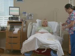 Female nurse testing and talking to a pregnant woman Stock Footage