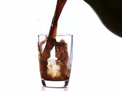 CU SLO MO Coffee being poured in glass / Vieux Pont, Normandy, France  Stock Footage