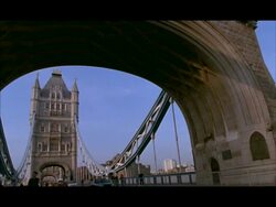 MS Low angle view of traffic crossing Tower bridge, London, England Stock Footage