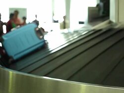 HD:Colorful baggage moving on belt. Stock Footage